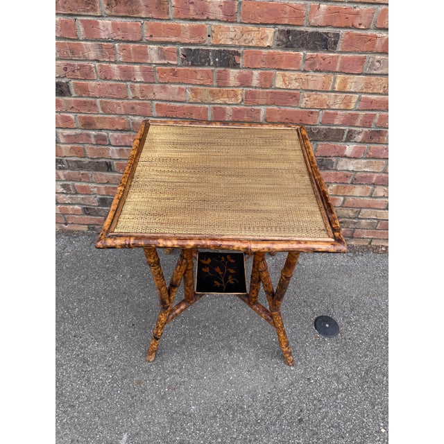 This is a beautiful 19th century English bamboo side table! Tables like these make excellent accent pieces because their...