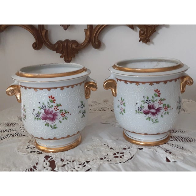 Gorgeous Old Paris porcelain cache pots- planters or vases. Each side portrays a different style- elegant floral and royal...