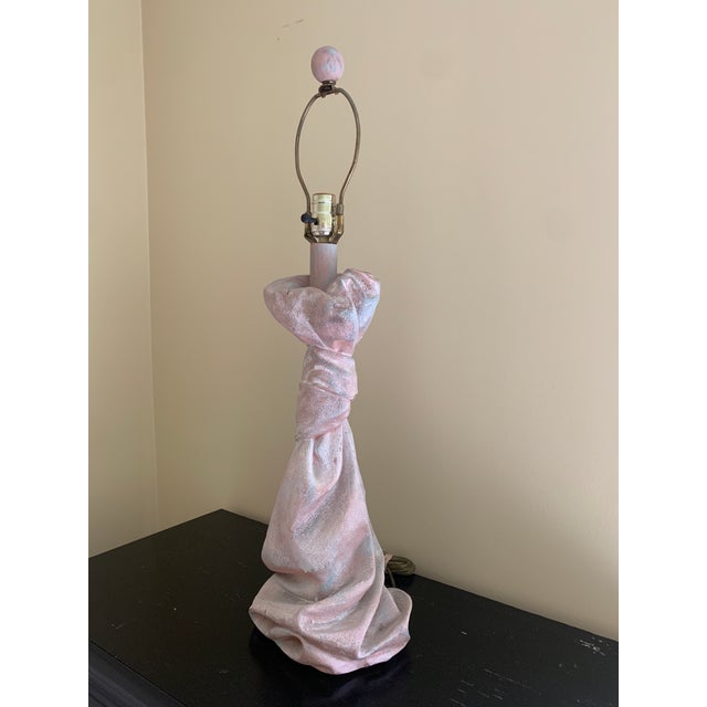 A gorgeous trompe l'oeil knotted and draped pastel pink plaster table lamp Attributed to John Dickinson USA, Circa 1970s...