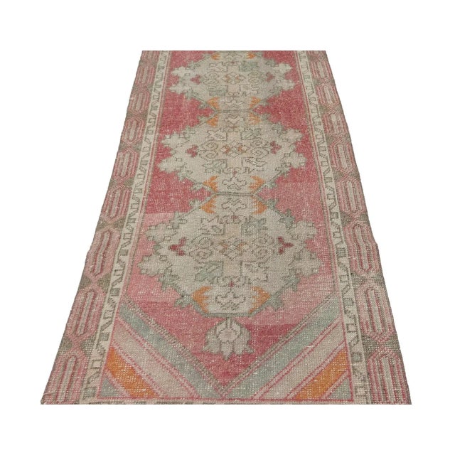 Vintage handknotted washed out rug from Konya region of Turkey. Approximately 50-60 years old. In very good condition.