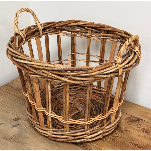 Vintage French style rectangular loose weave wicker basket with handles. Possible blanket, magazine, record or firewood...