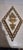 Set of four vintage Homco diamond-shaped wall plaques, dated 1971, in gold-tone ornate scrollwork frames on cream backing....