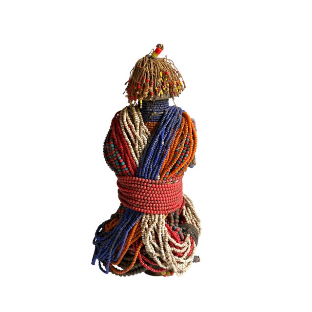 Superb vintage African Fali fertility doll decorated with multiple layers of trade glass beads and cowrie shells, minor...