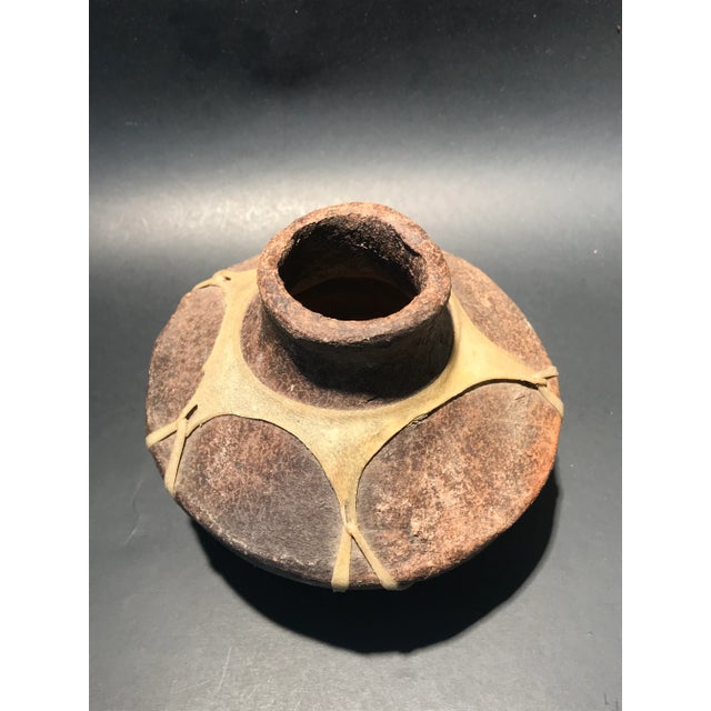 A fantastic vintage terracotta fermenting pot of the Tarahumara people, Copper Canyon, Northern Mexico. Deaccessioned from...