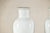 Pair of Classic White Porcelain Vases with Timeless Elegance For Sale - Image 10 of 12