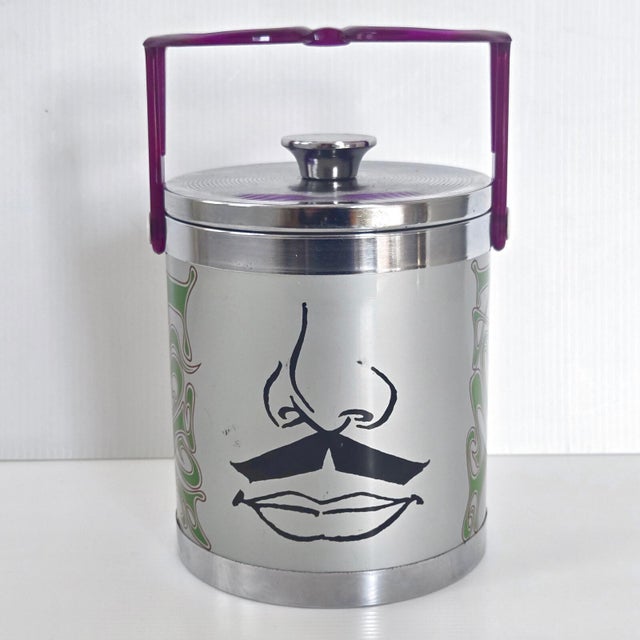 Fair condition. Usual signs of wear and scratches, particularly on the lid, above the left moustache, and to the left of...