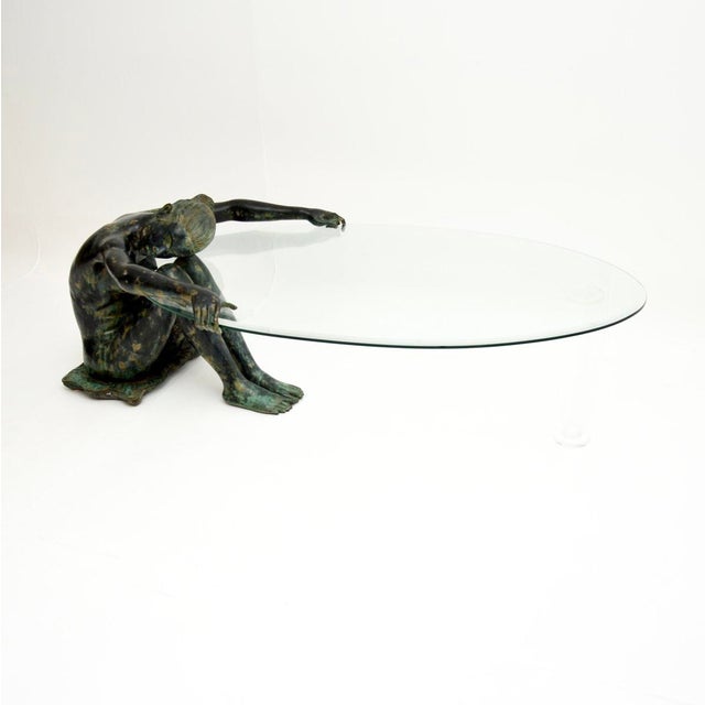 An amazing vintage sculptural bronze coffee table in the form of a nude woman. This was made in France, it dates from...