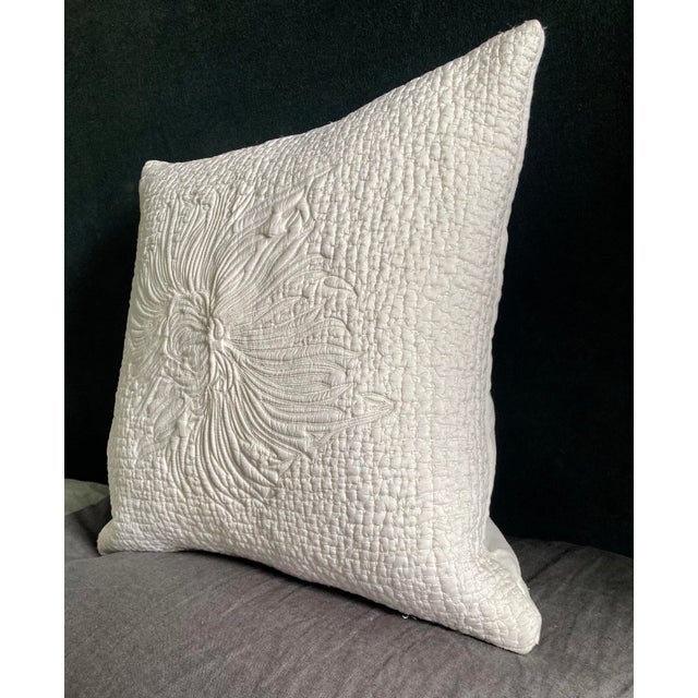 A unique hand quilted decorative pillow cover with a Dahlia Floral motif . From Sethi & Sethi, this has an exquisite...