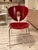 The backrest and seat of the Globus Chair (1994) are made from beech plywood or plastic, with a gently curved back for...