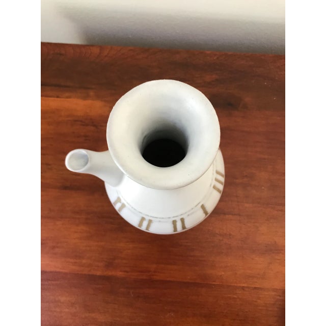 While this is a vintage piece, it feels very modern! Signed on the bottom.