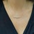 Natural 0.25 carat total weight round brilliant diamond curved double bar station necklace in 14K yellow gold, featuring...