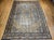 "A refined vintage Persian Tabriz rug from the early 20th century, this hand-knotted masterpiece features a classic Herati...
