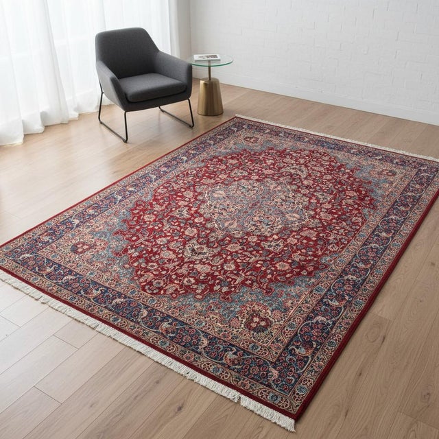 This beautiful Persian Tabriz Rug features a stunning central floral medallion design, with intricate details in shades of...