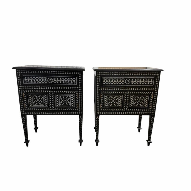 Offered is a stunning pair of Studio A Home by Global Views “Bhawana” nightstands featuring genuine hand-inlaid mother-of-...