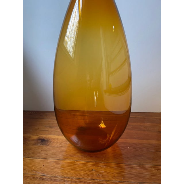 Elegant architectural floor vase attributed to Wayne Husted for Zeller. The vase stands 31 inches tall by about 11 inches...