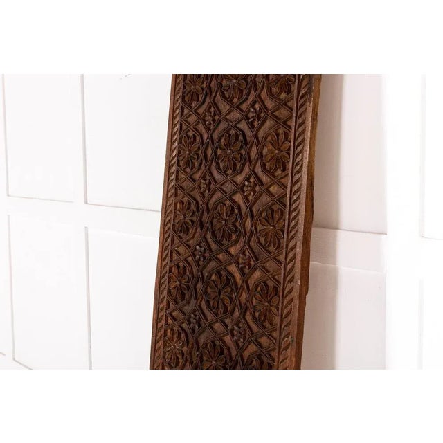 A Very Large 19th Century Carved Hardwood Panel, Probably Syrian. The panel with all over carved floral and scrollwork...