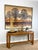 Vintage 1980s Art Deco inspired parquet top, gold trim console table. The American made console blends classic with modern...