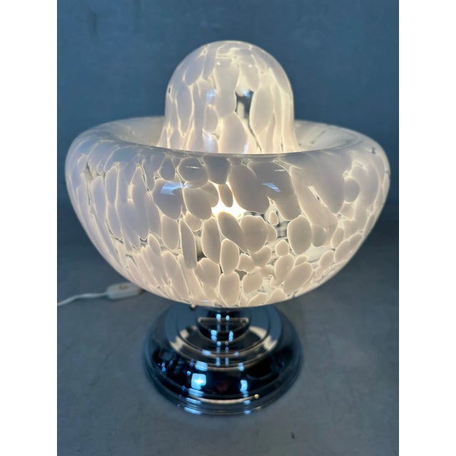 Vintage Murano mushroom table lamp. Perhaps from Mazzega. Murano glass in excellent condition. Chrome fixture. Diameter:...
