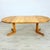 Dimensions: H 29.5” x W 41.5” Extended: W 81.7” Vintage Danish extendable solid pine dining table manner of Rainer...