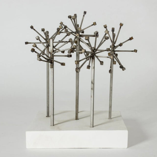 Sculpture with the name “Cobble-stone Uprising” (“Knottens uppror” in Swedish) by the artist Fred Leyman. Made from steel...