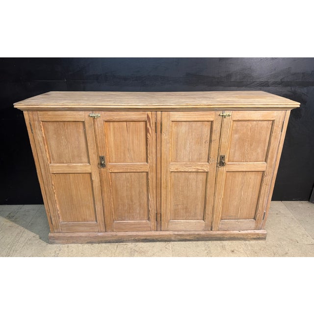 A very good quality Housekeepers or Linen Cupboard dating to the mid 19th Century. Having 4 panelled doors opening to...
