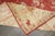 Exquisite early 20th century Turkish Oushak rug with a red background and ivory and gold central medallion and border....