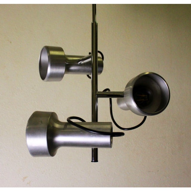 Vintage ceiling light in brushed aluminum and chrome metal. The 3 spots are removable so that you can direct the light...