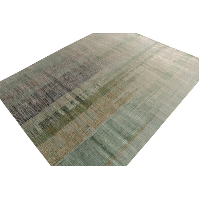 Hand-knotted in fine quality wool & silk, a 12x15 abstract rug showcasing an awe-inspiring vision of modern style. From...