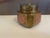 A beautifully crafted vintage brass incense burner featuring a mixed‑metal design with a raised copper medallion...