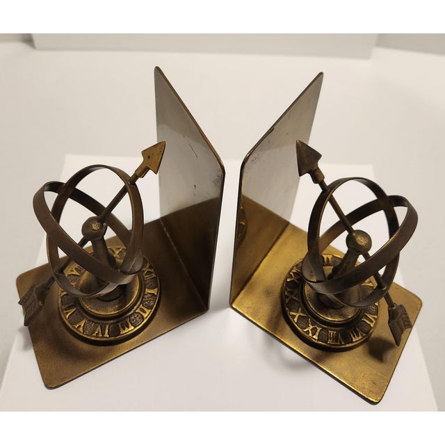 Elevate your library, home office, or study with this striking pair of vintage heavy cast brass bookends. Designed in the...