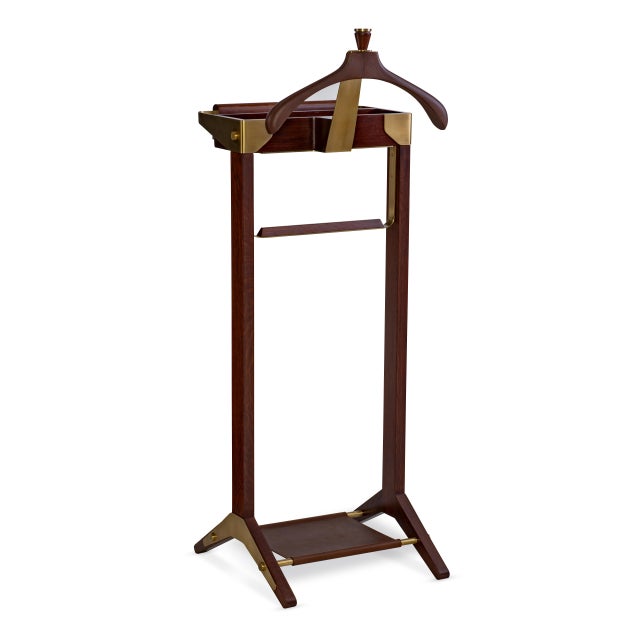 A refined expression of form and function, this gentleman’s valet stand combines traditional craftsmanship with modern...