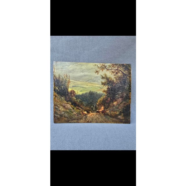 Small oil painting of a rural landscape with cows on wood. The wood is warped and about a quarter inch thick and unframed....