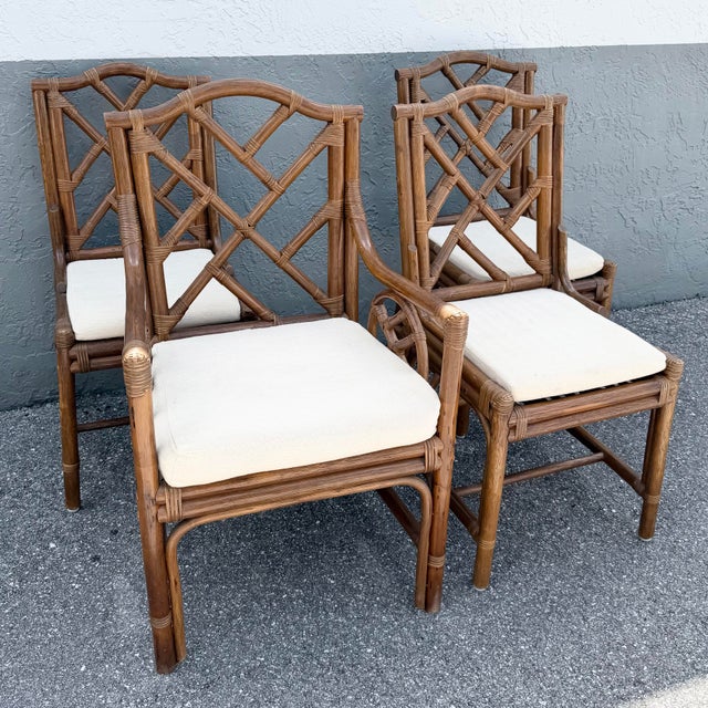 Side chairs: 18”w, 22”d, 38”h This handsome set of four vintage dining chairs blends classic Chippendale-inspired styling...