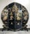 A mid-century, black lacquer, chinoiserie, round room divider/screen consisting of 4 panels on painted lion legs. The...
