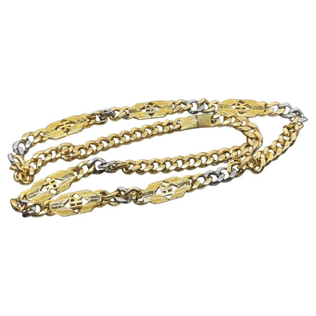 This piece of costume jewelry designed by Helena Rubinstein, showcasing a statement chain necklace with a striking two-...