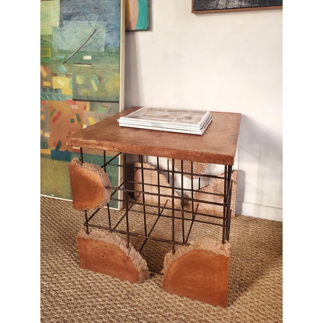 Side table in iron and concrete by Darius Bagavicius. This piece has an attribution mark, I am sure that it is completely...