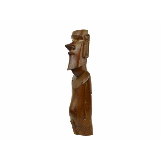 This captivating Mid-Century Moai sculpture is a testament to the skill and artistry of Pacific Islander craftsmen. Hand-...