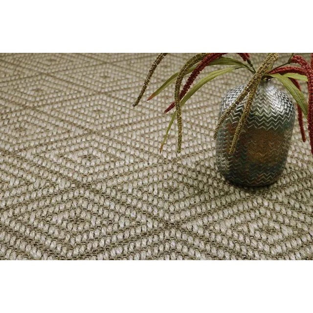Made from 100% sisal, Aria is a statement piece with its striking diamond pattern. The textural nature of sisal, in...