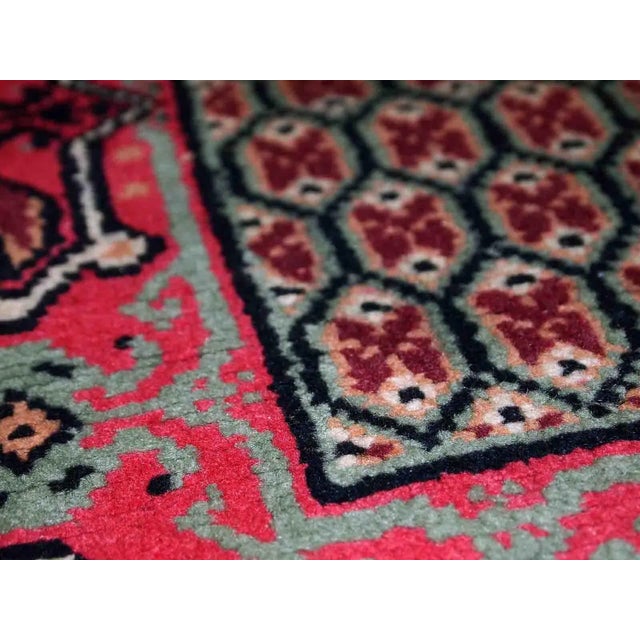 Vintage Algerian Berber rug in original good condition. This rug is from the end of 20th century made in pink wool....