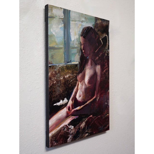 The painting "Stillness" captures a moment of serene introspection, featuring a seated figure bathed in soft, natural...