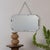 Beautiful Art Deco mirror from France, 1930s. Rectangular mirror with beveled octagonal edge secured to a wooden back....
