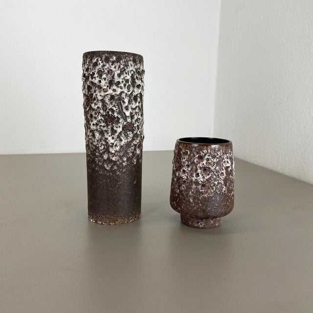 Article: Set of two fat lava art vases Producer: Jopeko Ceramics, Germany Decade: 1970s These original vintage vases was...
