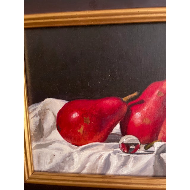 A very nice representation of three red pears and a marble. Painted by Eric Forstmann in 1936.
