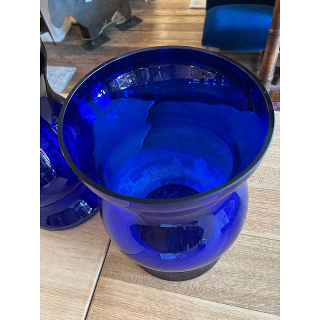 Sensational bright cobalt blue very large vases or candle hurricanes. Striking and beautiful accessories! Details...