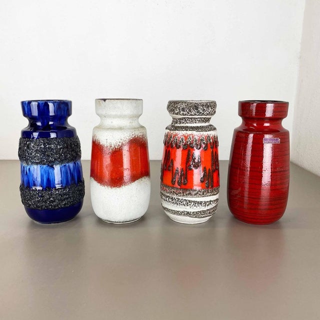 These original vintage vases was produced in the 1970s in Germany. It is made of ceramic pottery in fat lava optic. Super...