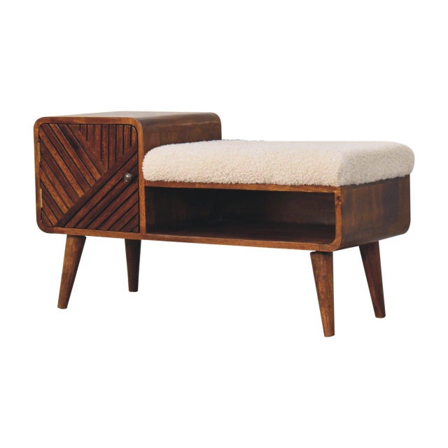 Combining comfort and craftsmanship, this telephone table bench features a hand-carved drawer and a soft bouclé seat....