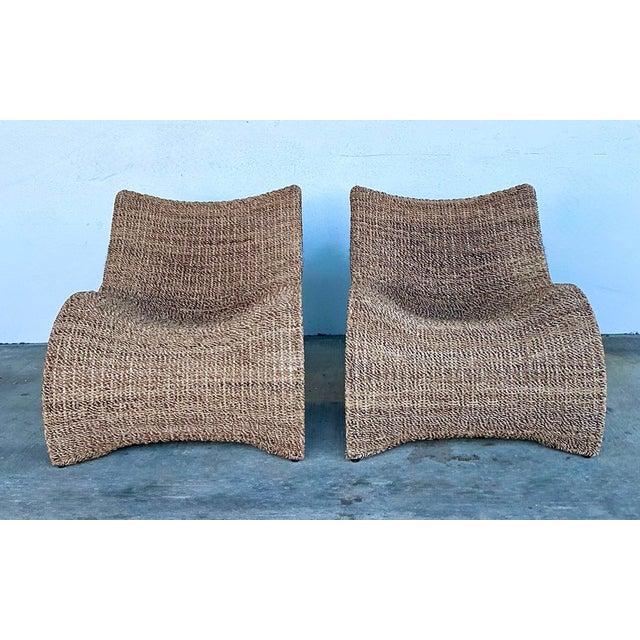 Embrace the art of organic modernism with this extraordinary pair of vintage biomorphic lounge chairs. Expertly hand-woven...