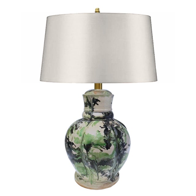 This stylish mid-century Italian table lamp is made out of terracotta with a marbleized glaze in green and black over a...