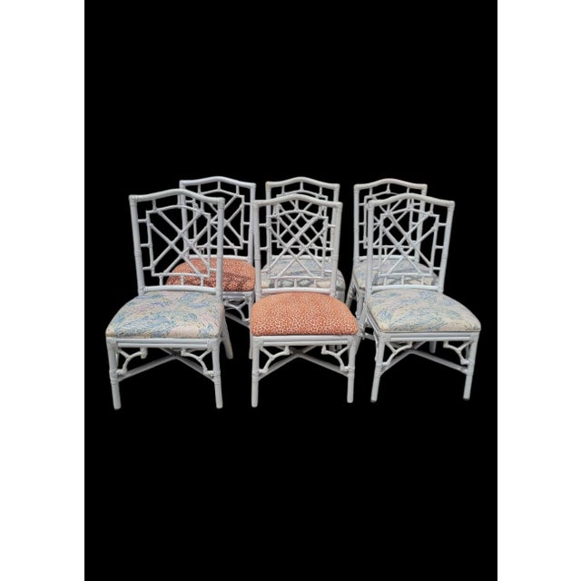 A wonderful set of 10 Chinese Chippendale white rattan Palm Beach regency style dining room chairs made by Lexington...