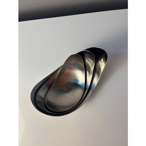 This leaf serving bowl set reflects the organic design language of danish designer helle damkjær for the renowned georg...